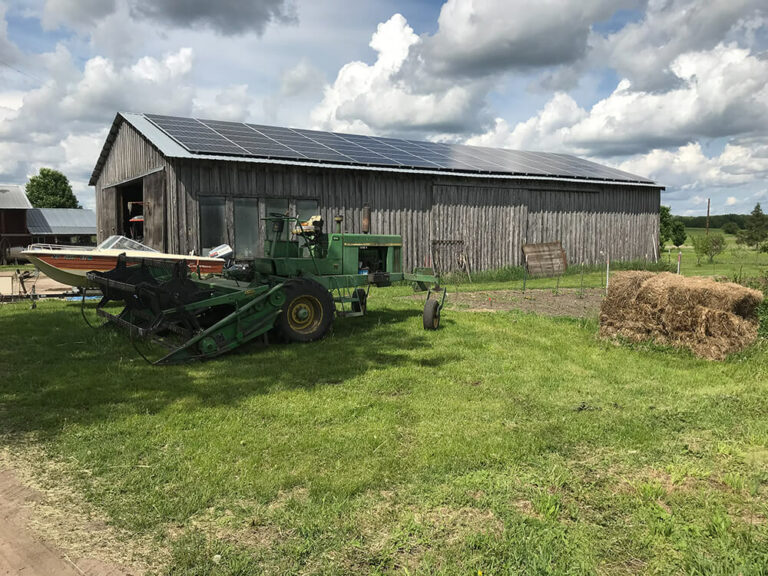 Installing solar panels as part of organic family farm